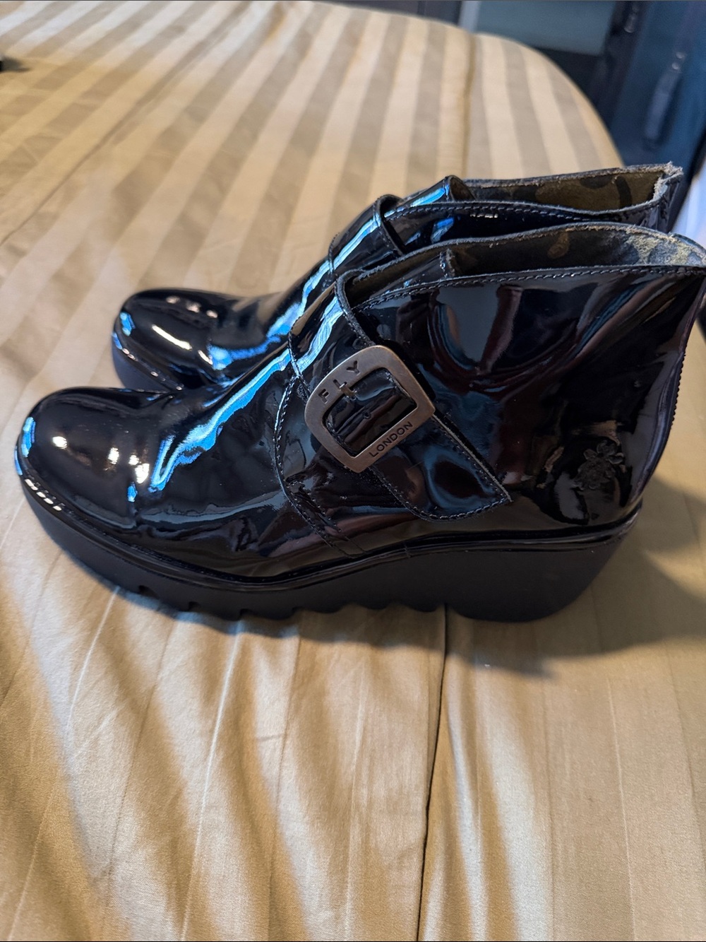 Fly London Black Gloss Wedge Ankle Boots with Buckle Accent
